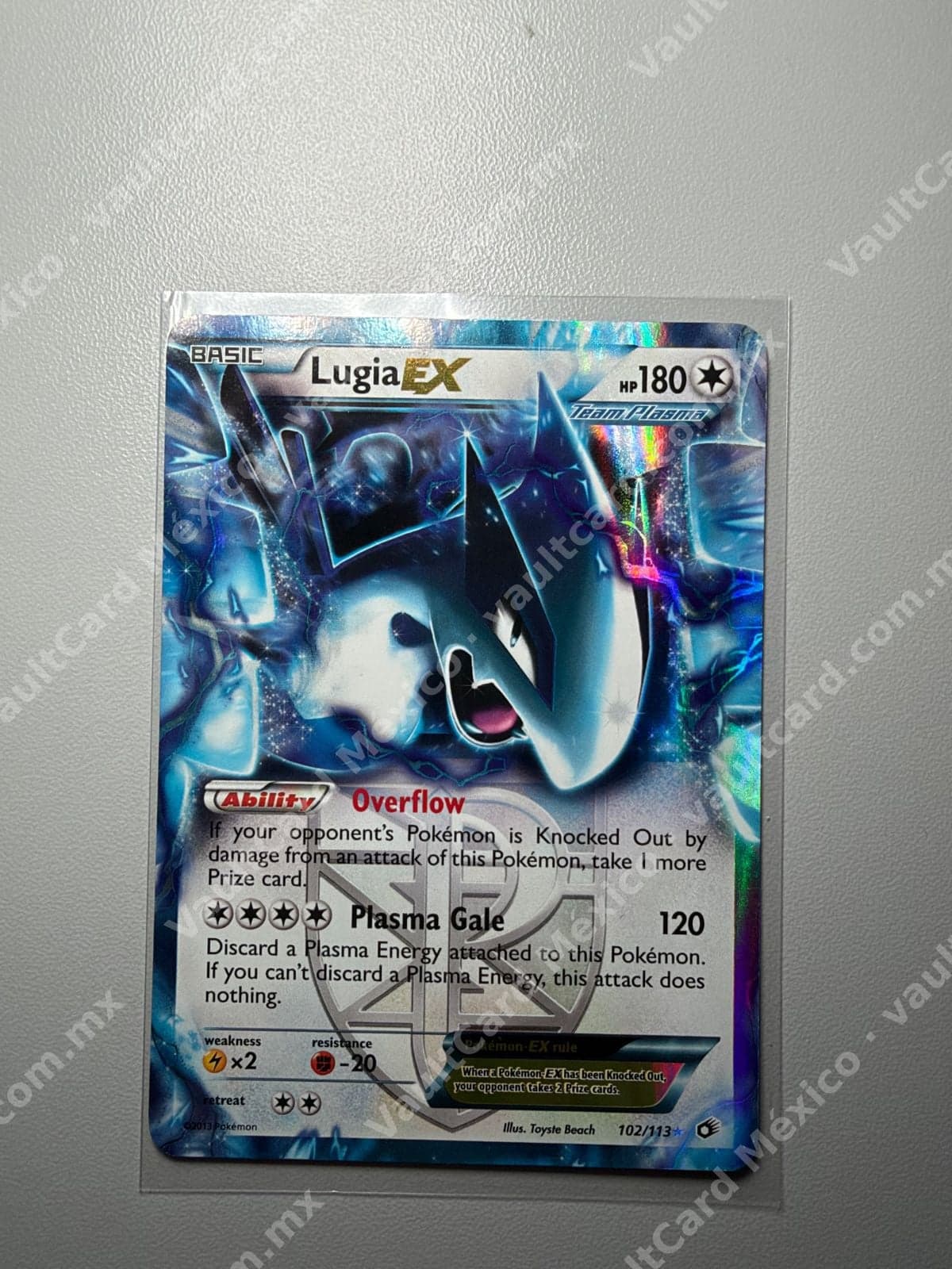 Lugia EX 102/113 - Plasma Storm Inglés Team Plasma