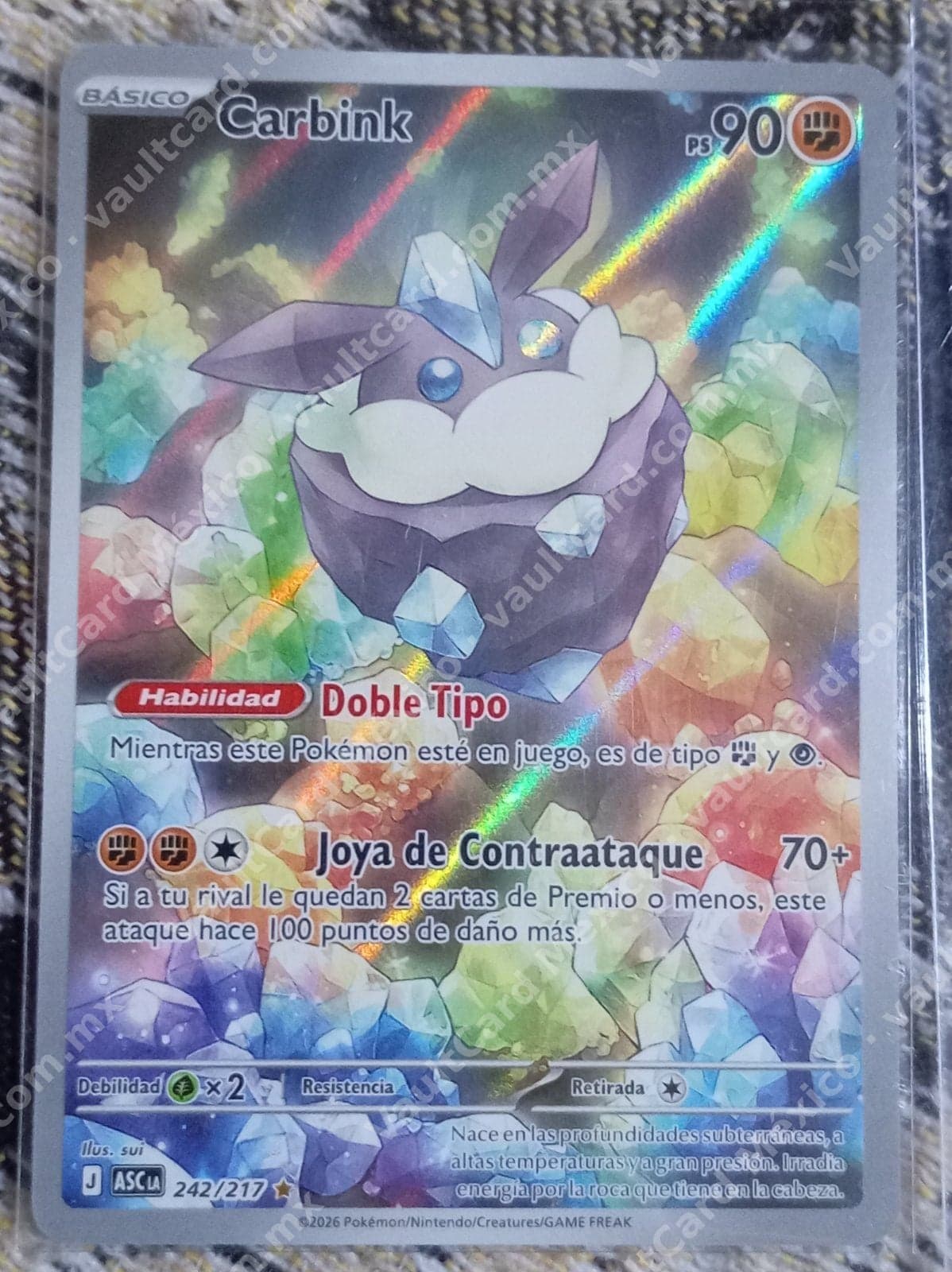 Carbink 242/217 - (ASC) Español Illustration Rare
