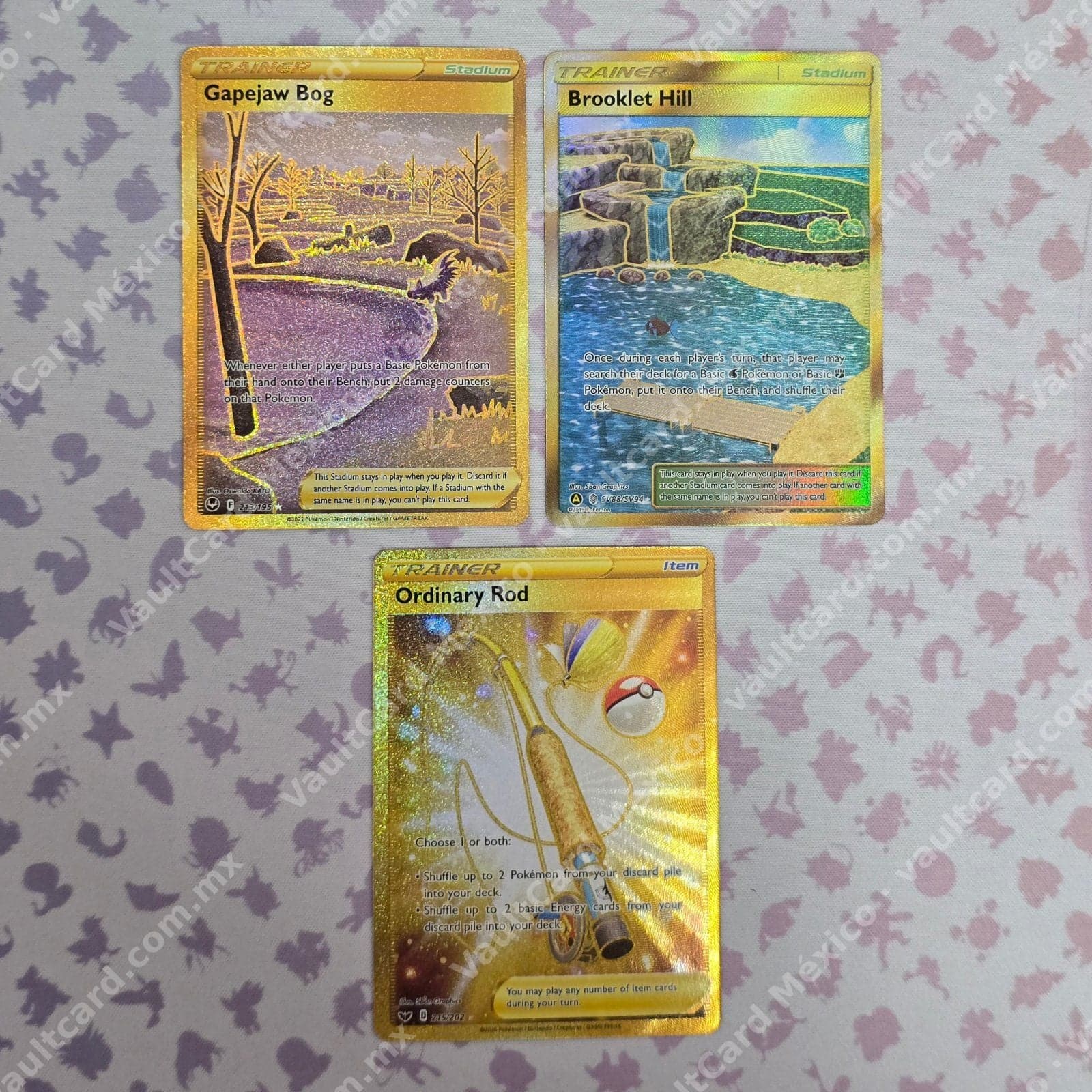 Lote 3 Cartas Trainer Gold - Gapejaw Bog, Brooklet Hill y Ordinary Rod (Inglés)