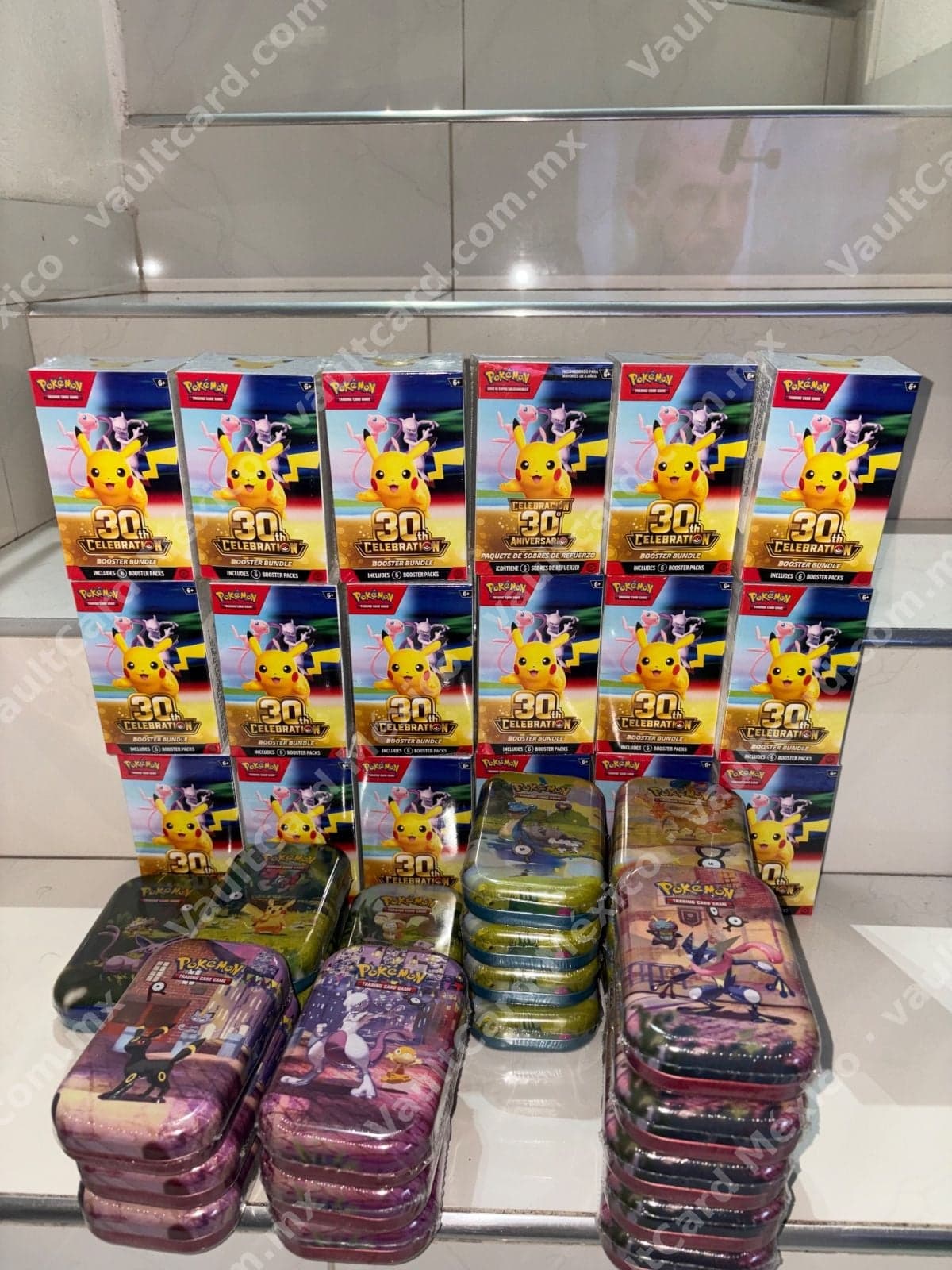 23 mini tin , 18 booster bundles
