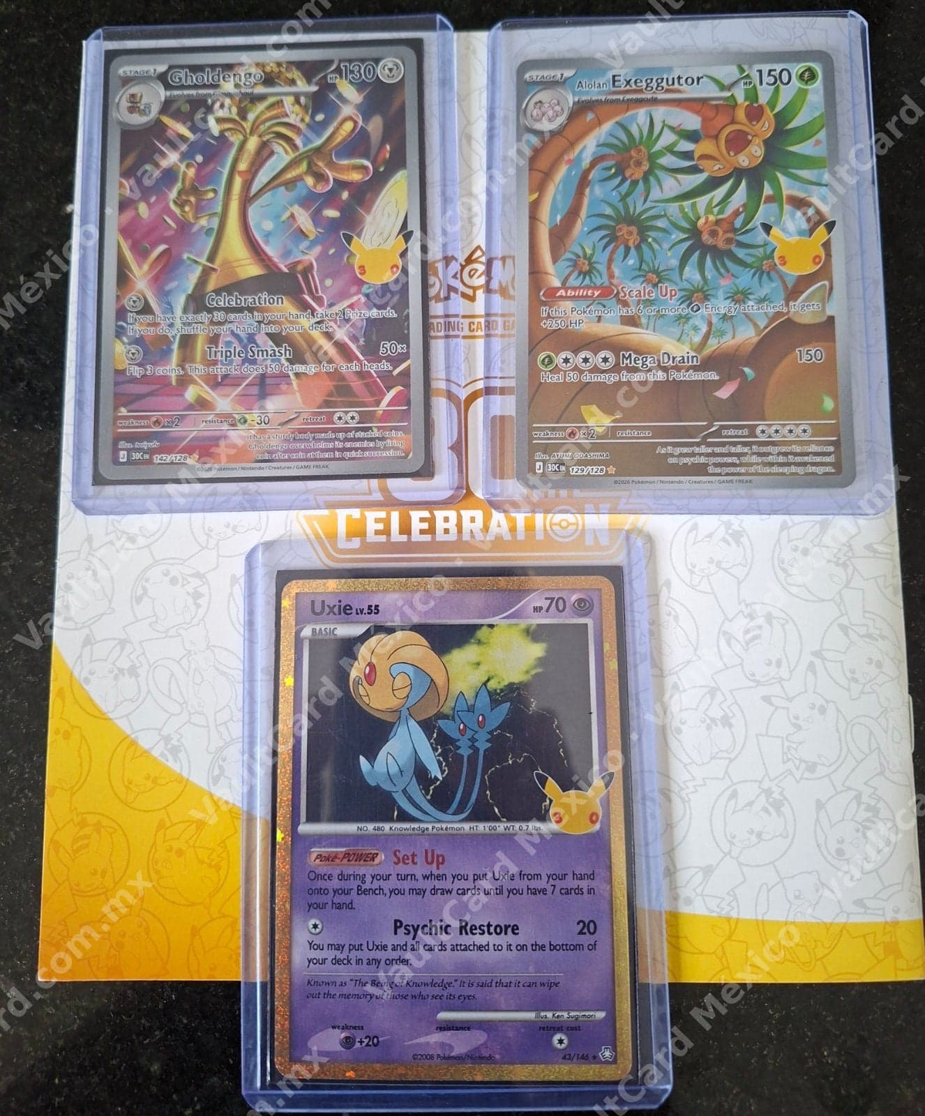 Lote 3 Cartas Pokémon Celebrations 30th - Gholdengo, Alolan Exeggutor y Uxie (Inglés)