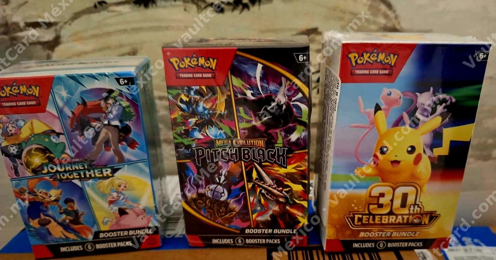 Lote 3 Booster Bundles Pokémon TCG - Journey Together, Pitch Black y 30th Celebration (Inglés)