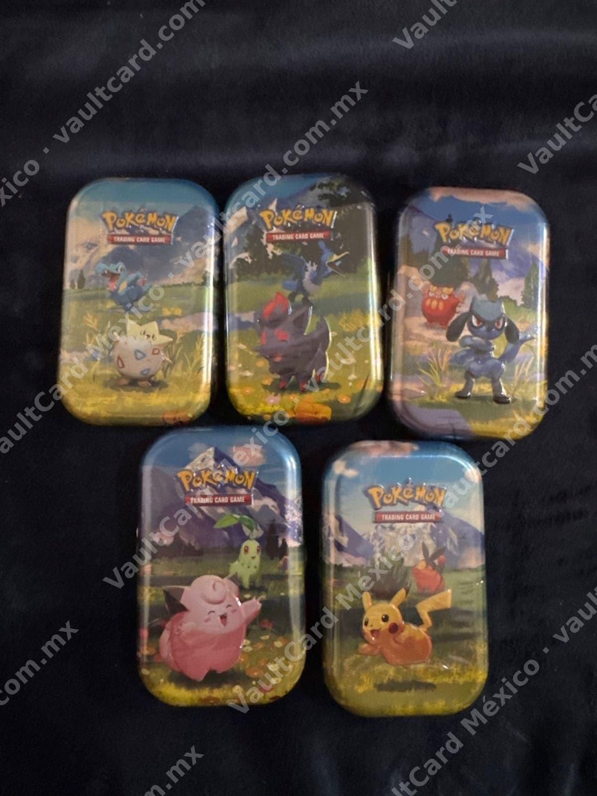 Lote 5 Mini Tins Pokémon TCG Sellados - Inglés (Togepi, Zorua, Riolu, Cleffa, Pikachu)