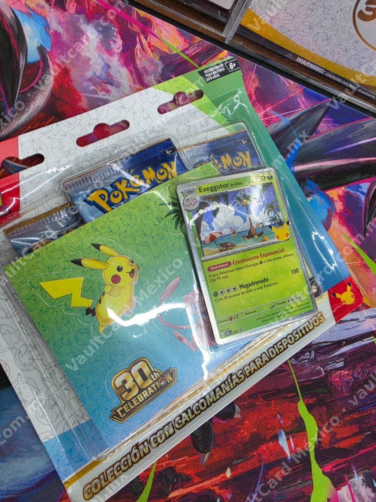 Colección 30th Celebration con Calcomanías + Carta Exeggutor de Alola - Sellado Español