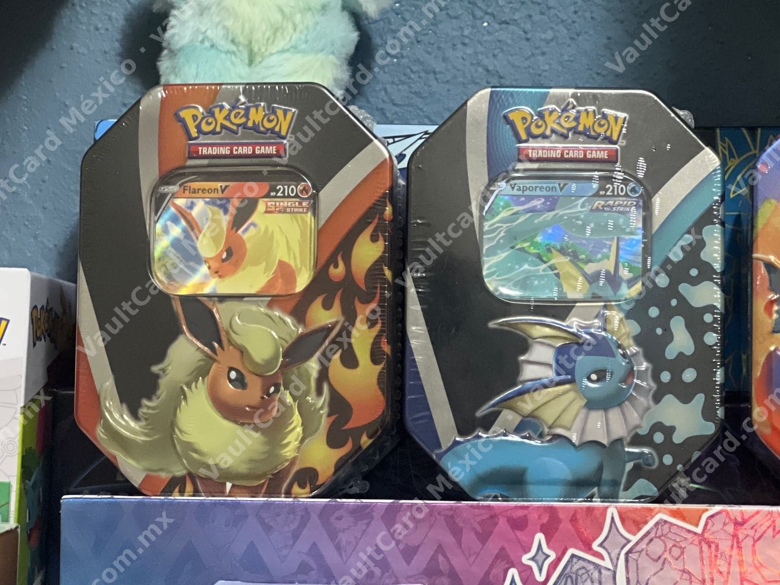Lote 2 Latas Eevee Evolution Tin Flareon V y Vaporeon V Inglés (Sellado)